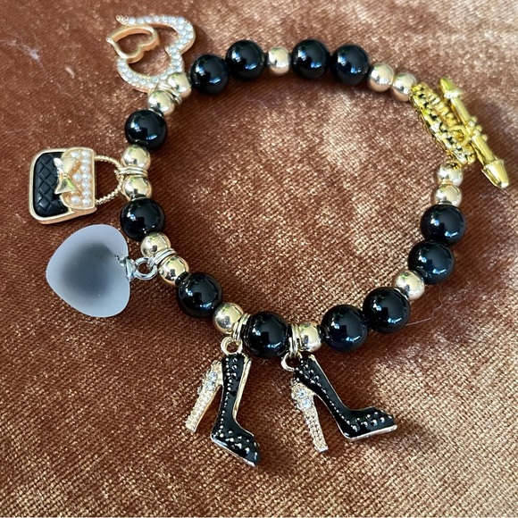 New handcrafted shopping themed bracelet combines blackbeads & goldaccents - Picture 3 of 8